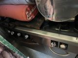 a metal pan sitting on top of a stove in a kitchen