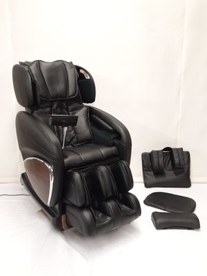 une photo d'un fauteuil de massage équipé d'un repose-pieds