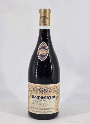 a bottle of wine that is sitting on a table