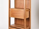 an image of a wooden shelf with drawers on it