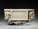 an image of a white marble plaque with a picture on it