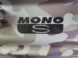 a close up of a drum with a mono logo on it