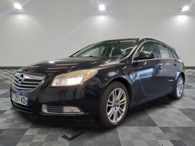 a picture of a black car parked in a garage