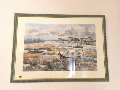 a picture of a painting hanging on the wall