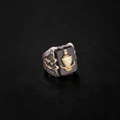 Bague chevalière en argent (800 millièmes), le chaton serti …