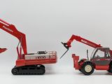 two toy vehicles that are red and black and one is a red excavator and the other is a black and white excavator