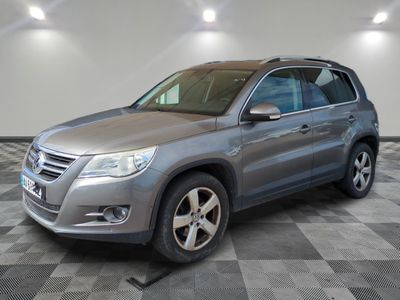 a picture of a silver suv parked in a garage