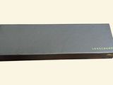an image of a black box with a green logo on it
