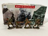 figurines of a group of toy soldiers with a box in the background