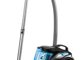 a black and blue vacuum cleaner with a hose