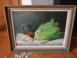a painting of lettuce, eggs and a pitcher on a table