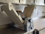 a machine that is sitting on a counter in a kitchen