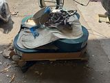 a pile of shoes that are on top of a suitcase