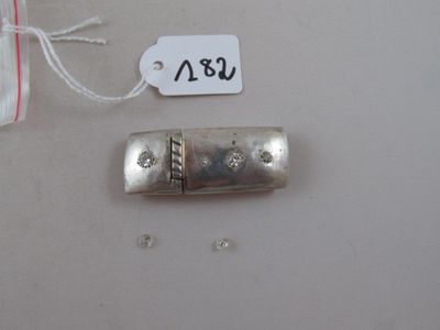 a small silver object with a price tag on it