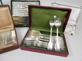 a box with silverware in it on a table