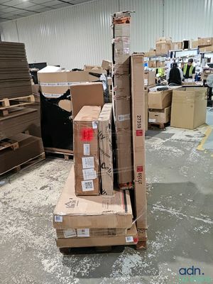 boxes stacked on top of each other in a warehouse