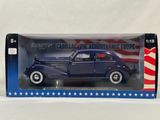 an image of a toy car in a box with an american flag on it