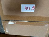 a cardboard box with a price tag on it