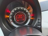 a close up of a speedometer in a car ' s dashboard