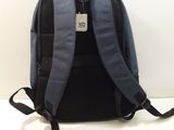 a backpack that is sitting on a white table