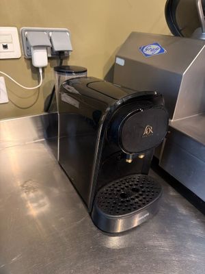 a coffee machine that is sitting on the counter