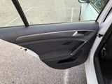 the door of a car is open to show the inside of it