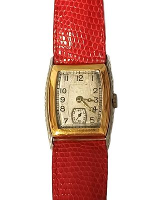 an image of a close up of a wrist watch on a white background