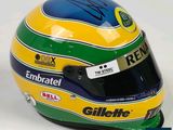 the helmet of a racing driver is displayed on a white surface