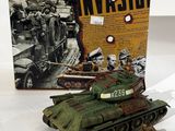 an image of a toy army tank and a box of military items