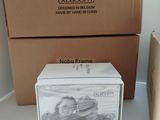 two boxes that have pictures on them on the table