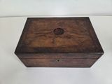 a small wooden box that is on a table