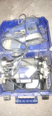 a blue tool case with tools in it on the floor
