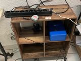 a desk with a keyboard and a monitor on top of it