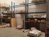 a large warehouse filled with lots of boxes and pallets