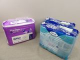 two packs of sanitary paper sitting next to each other on a table
