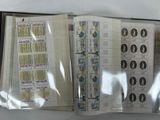 a lot of stamps on the pages of a book