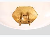 an image of a bathroom with a gold toilet seat