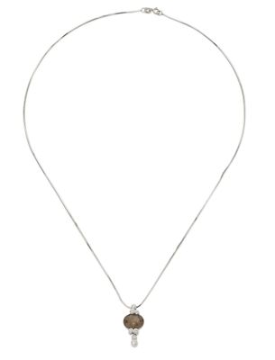 a necklace with a silver chain and a brown stone pendant