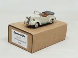 a toy car sitting on top of a cardboard box