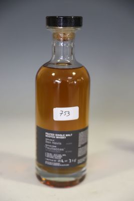 a bottle of alcohol that is sitting on a table