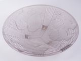 un bol en verre transparent orné d'un motif d'oiseau