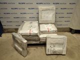 many boxes of mail sitting on a table in a room