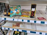 many snacks and snacks on the shelves in the store