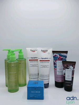 many different types of skin care products on a white surface