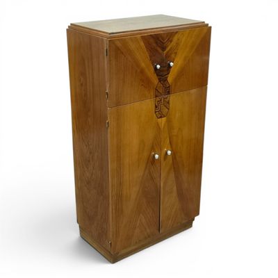 an image of a wooden cabinet with a door