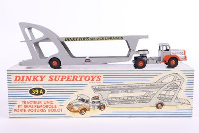 a toy truck with a crane attached to it ' s back