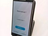 a cell phone that is sitting on a stand