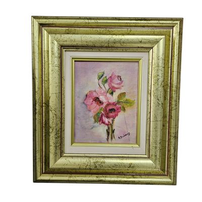 an oil painting of pink flowers in a gold frame on a white background