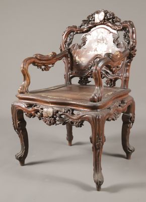 an image of a chair with a mirror on the back of it
