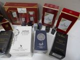 several different types of perfumes are displayed on a table